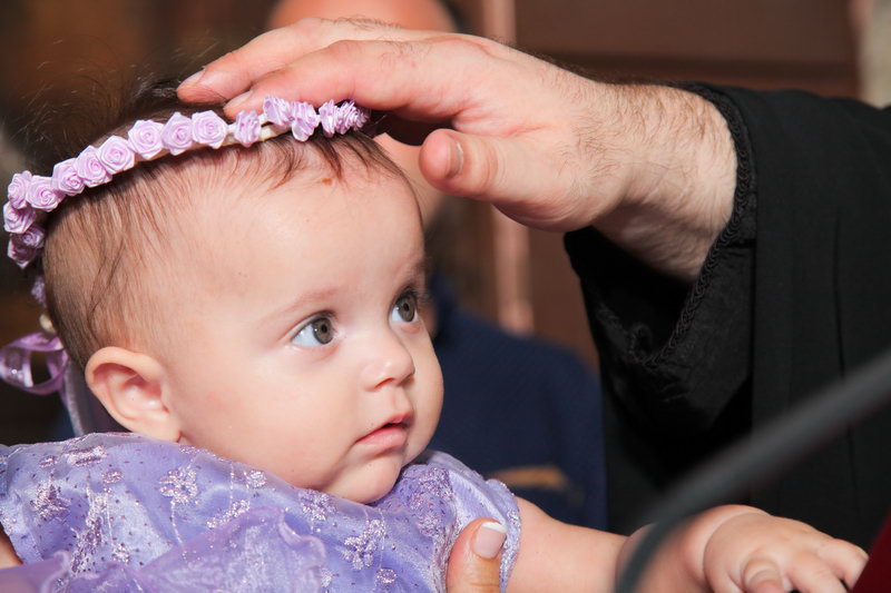 Οικογενειακή φωτογραφία κατά τη βάπτιση.